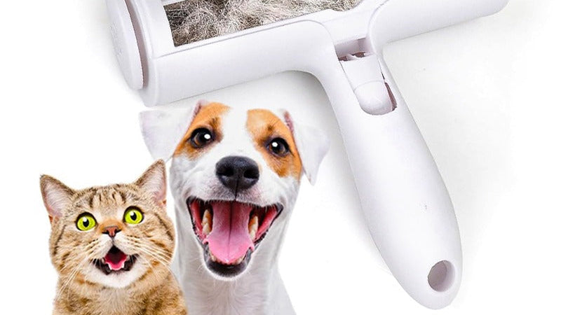 Pet hair removal roller with collected pet hair, featuring a cat and dog illustration on a white background.